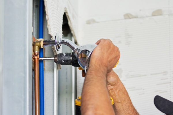 skilled contractors working on a bathroom renovation project